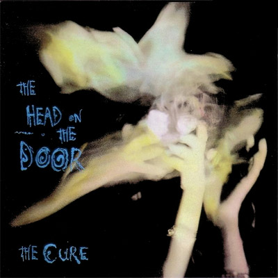 the_cure_-_the_head_on_the_door.jpg